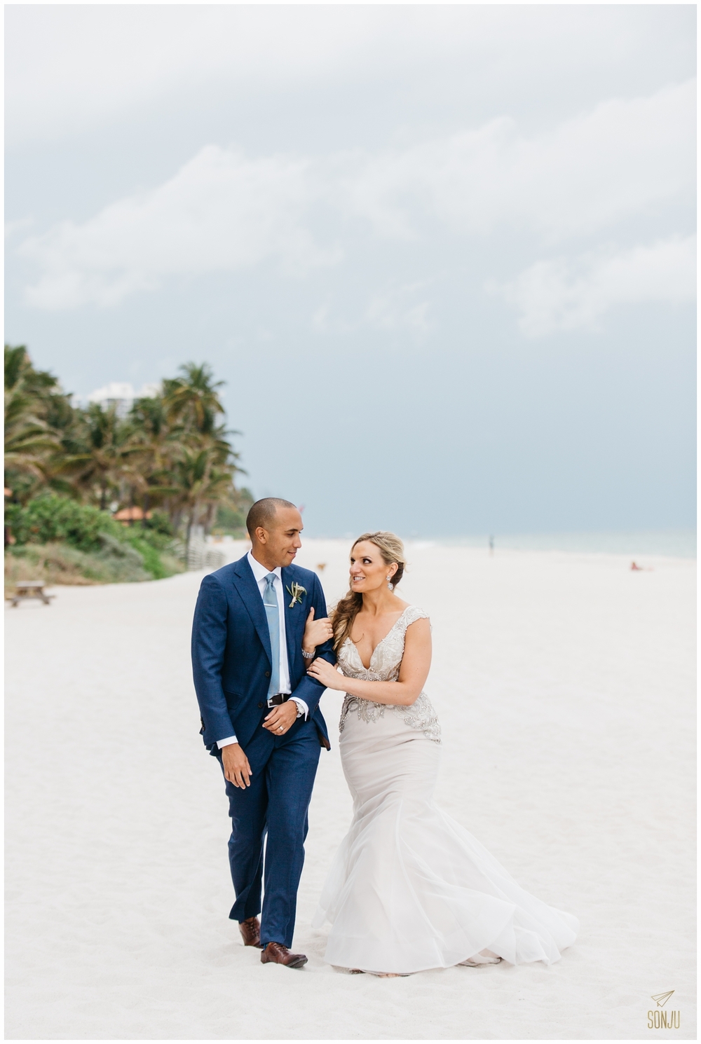 Bride and groom beach portraits at the Pelican Grand Resort Fort Lauderdale Florida