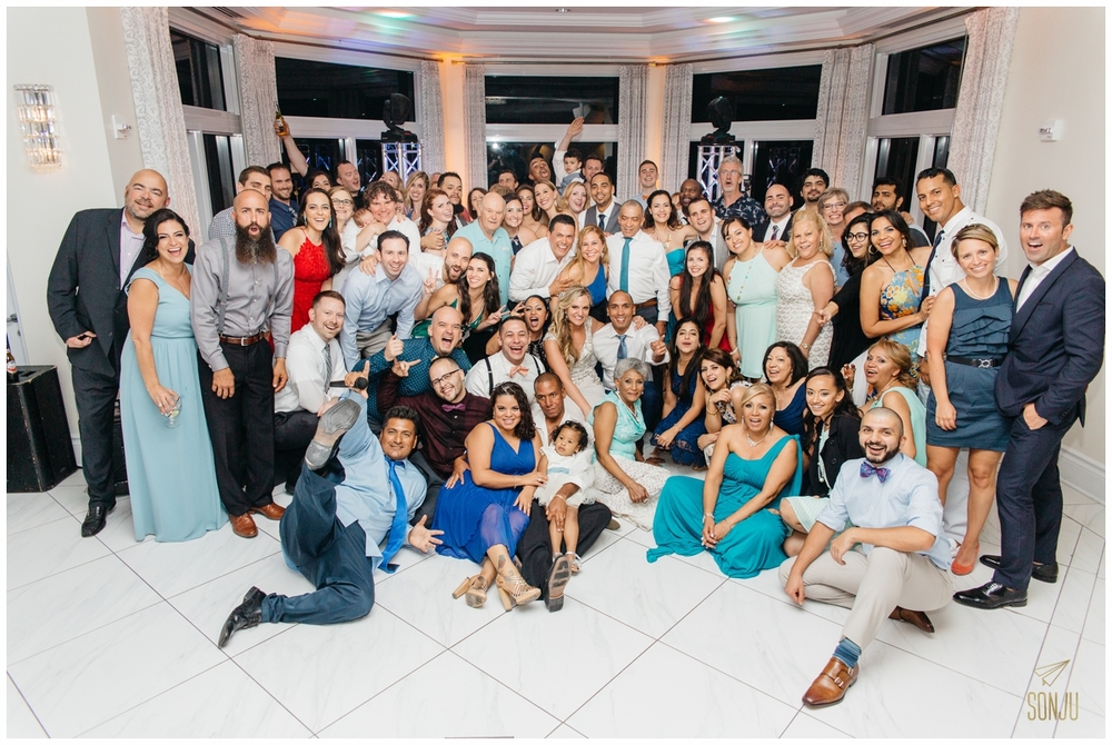 group shot at end of reception at the Pelican Grand Resort Fort Lauderdale Florida