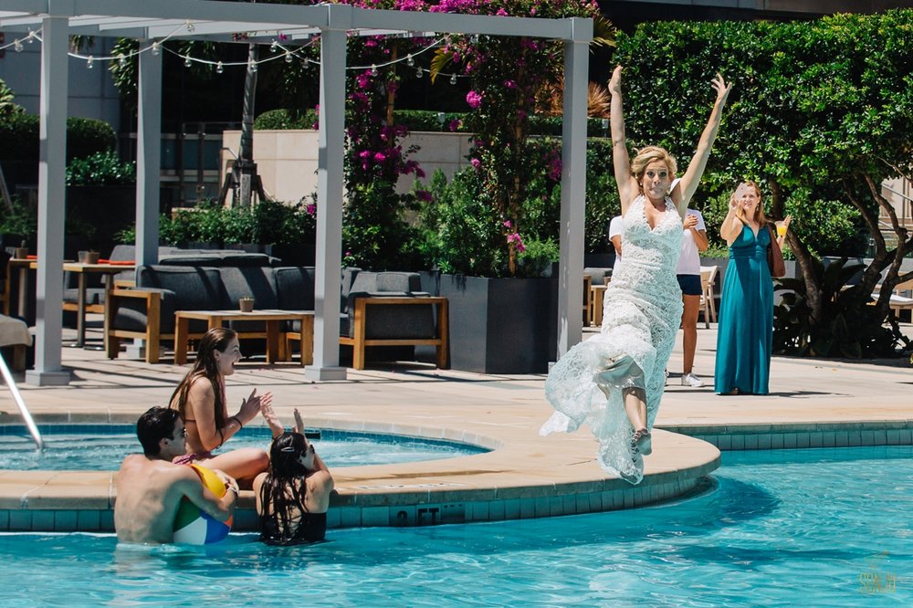 Bride jumps in pool at Four Seasons Miami 