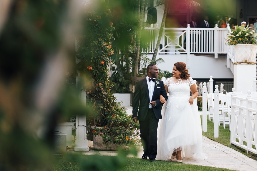 Bride and Groom take a stroll in the gardens at the Palms Hotel & Spa