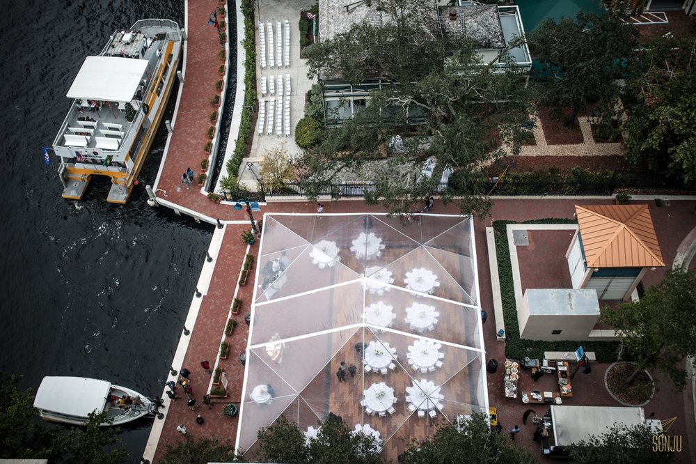  Aerial view of the Stranahan House in Fort Lauderdale Florida. Outdoor reception on the water under a clear tent.&nbsp; 