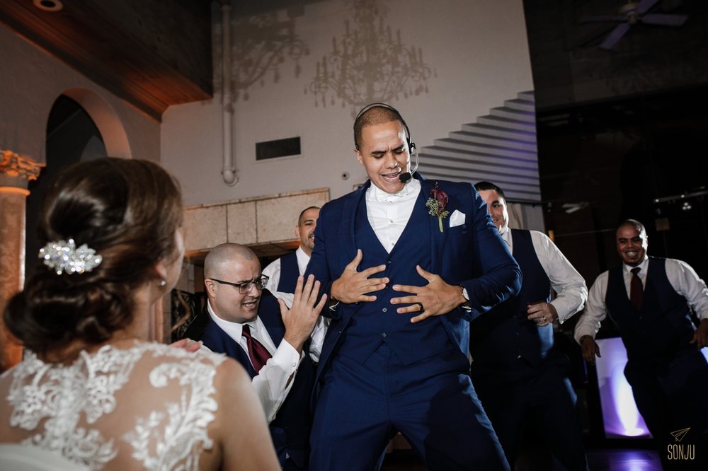 choreographed-groomsmen-dance-surprises-bride-at-coral-gables-country-club-miami-wedding-photographer