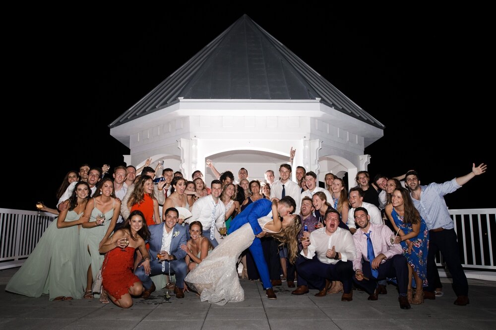 Group-shot-of-wedding-guests-outside-sonju-photography