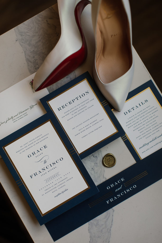 Classic wedding details and invitation suite flat lay