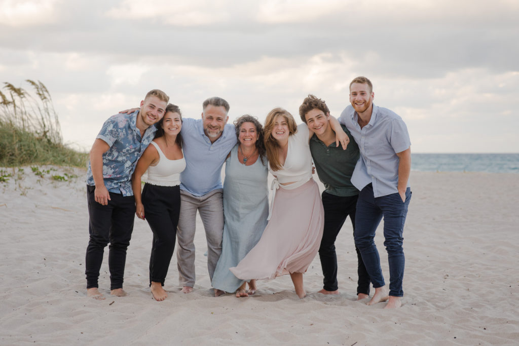 Palm Beach county family photographer grabs group shots on beach
