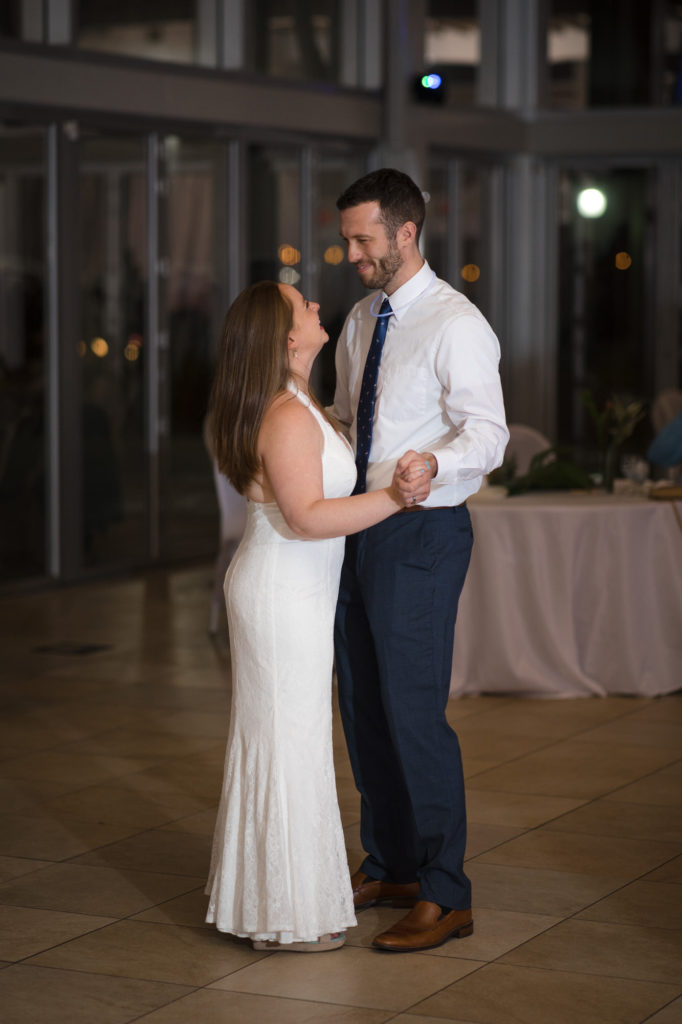 Newlyweds dance at their wedding reception at the West Palm Beach Lake Pavilion