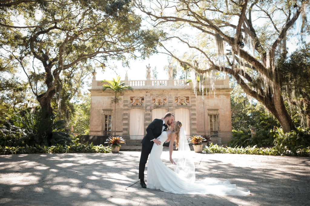 Bride and groom practice the dip at Vizcaya Museum and Gardens