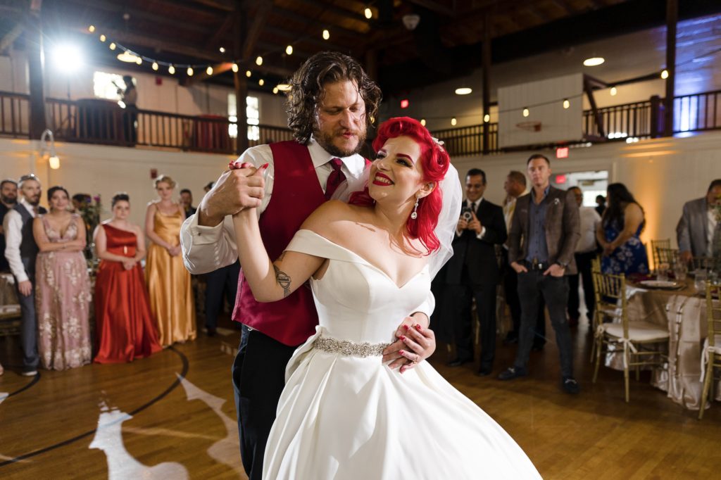 Couple enjoys their first dance at their Old School Square wedding