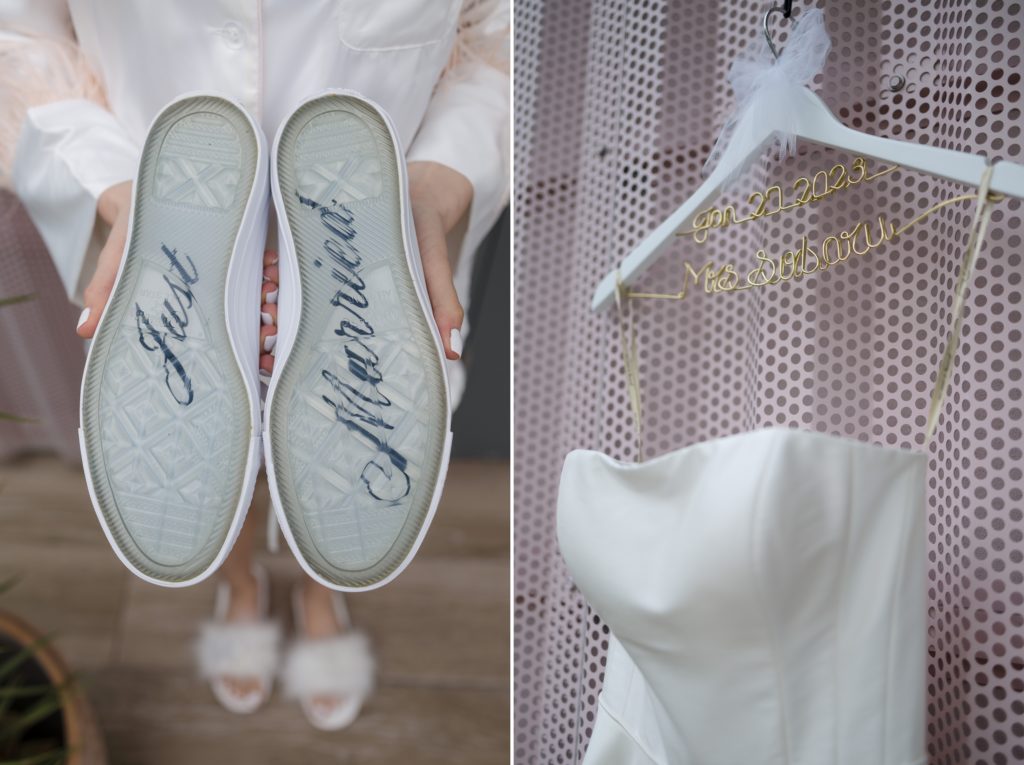 Bridal details, including custom tennis shoes and a wedding gown hanging on a pink backdrop for a wedding in Delray Beach Florida